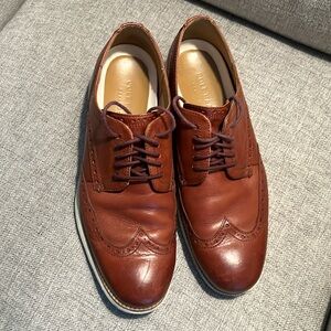 Cole Haan Grand OS brown leather dress shoes.